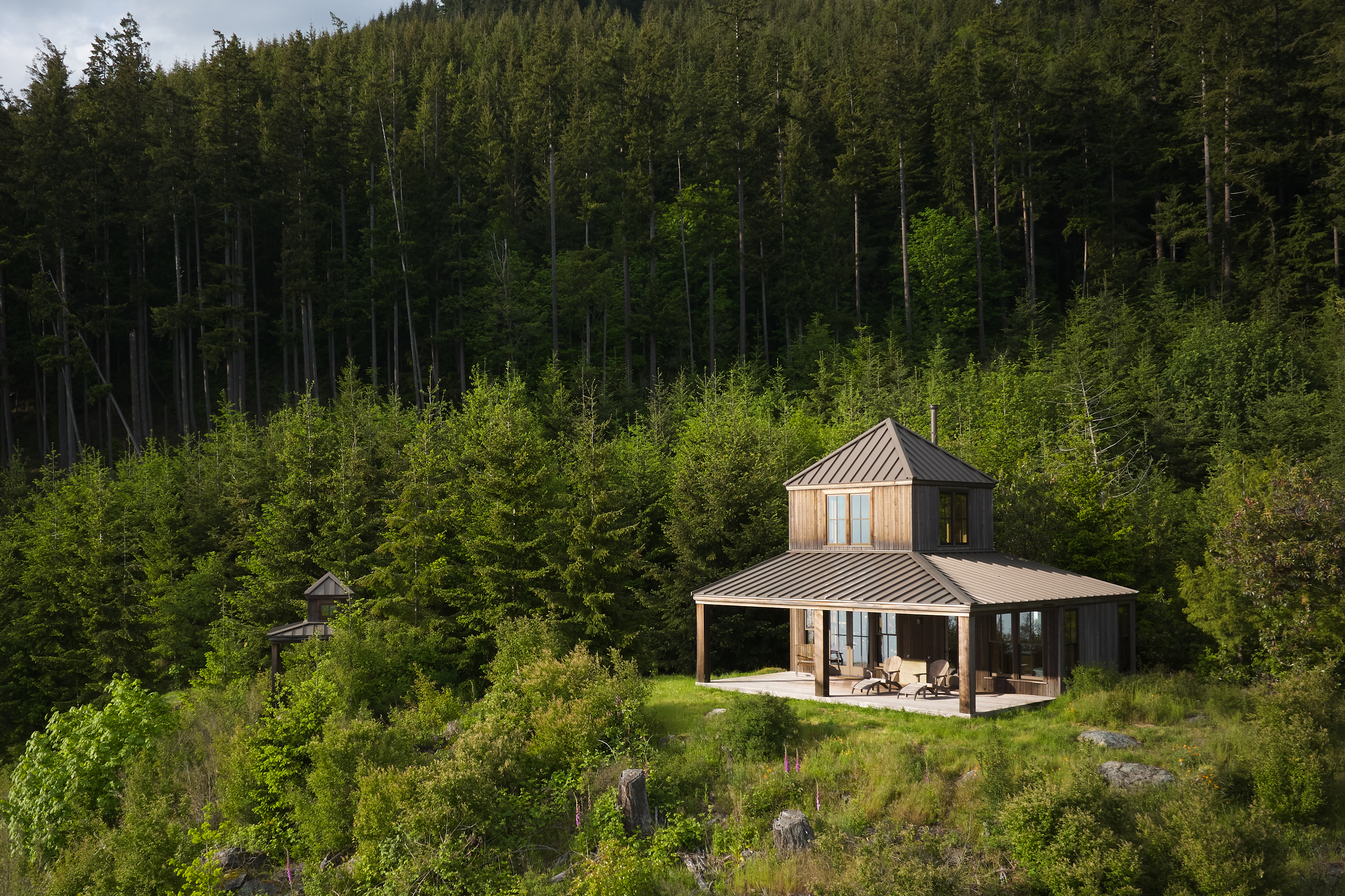 An Artist Studio sits atop a mountain in the pacific northwest.
